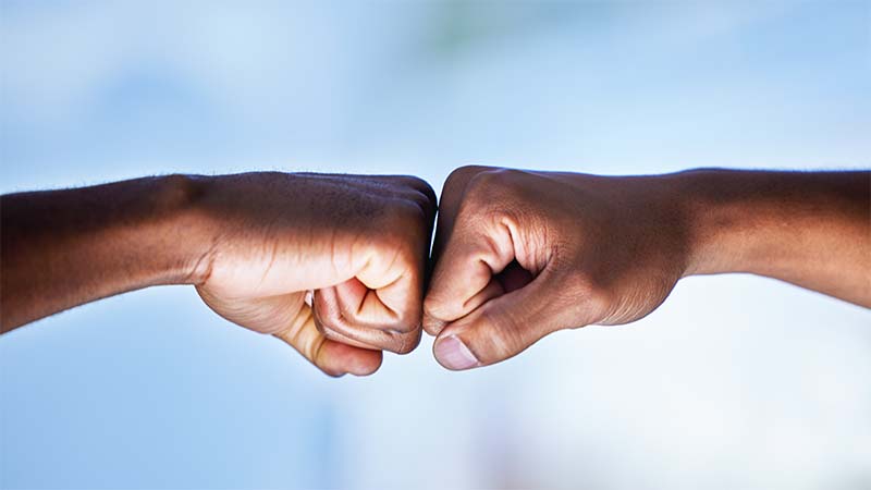 Fist Bump To Show Conflict Resolution